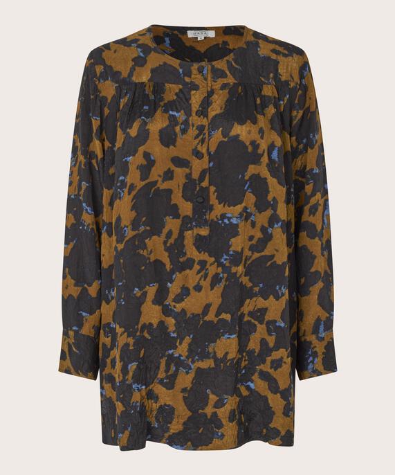 Gigise tunika, Breen