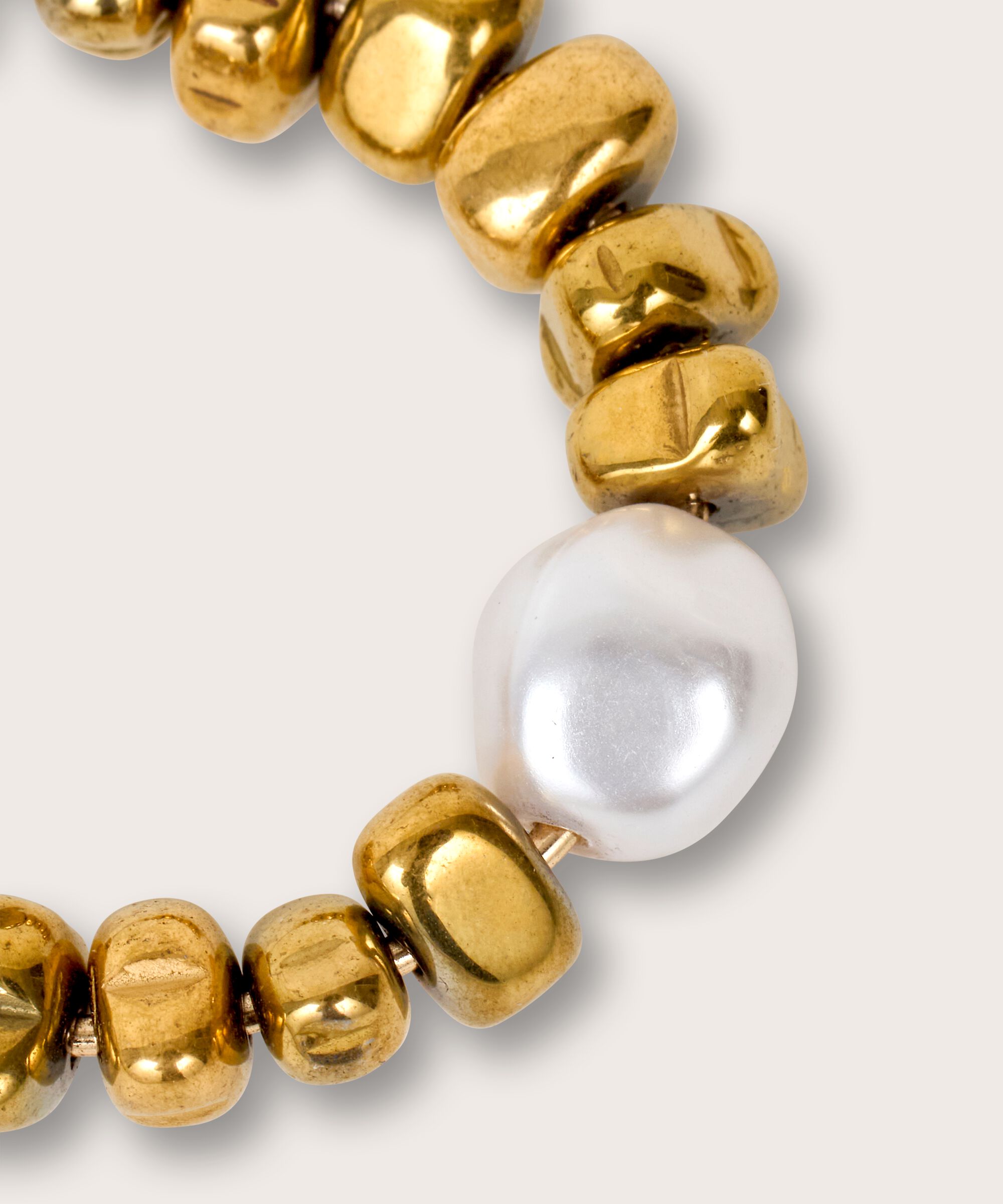 Rue Øreringer, Gold